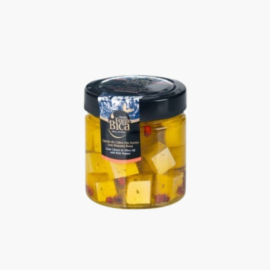Queso de cabra en aceite de oliva y pimienta rosa